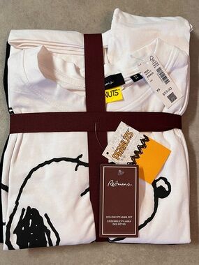 New Peanuts PJs top and pants with drawstring. XS. NWT
Retails $59